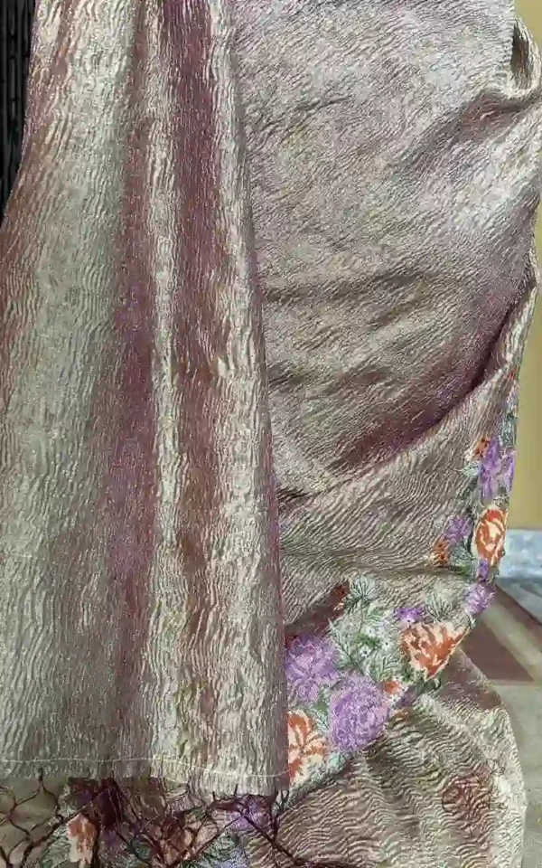 Wine on crush cutwork border with tussles on Tissue saree