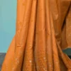 Gold color Gujrati mirror stitch work on Gachhi Tussar silk saree