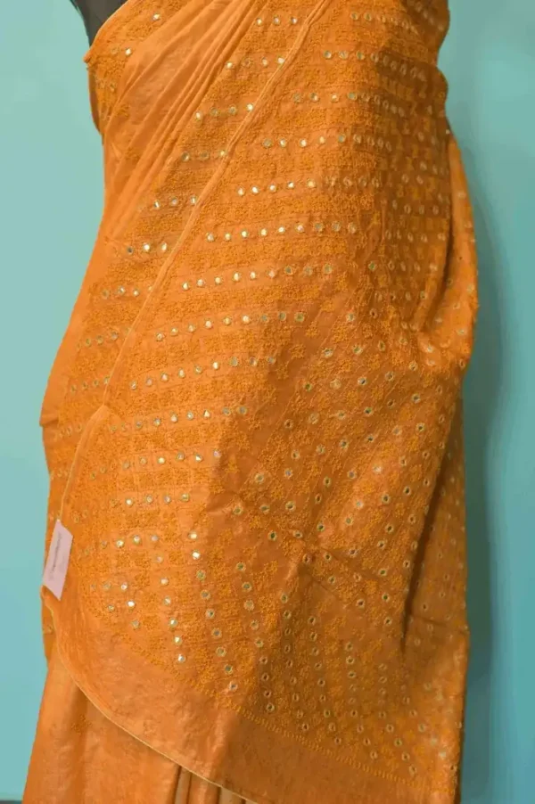 Gold color Gujrati mirror stitch work on Gachhi Tussar silk saree