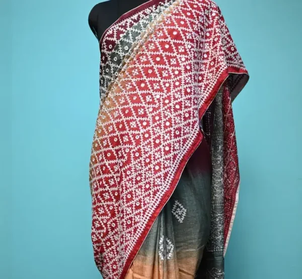Biscuit on white Gujrati mirror stitch work on Gachhi Tussar silk saree