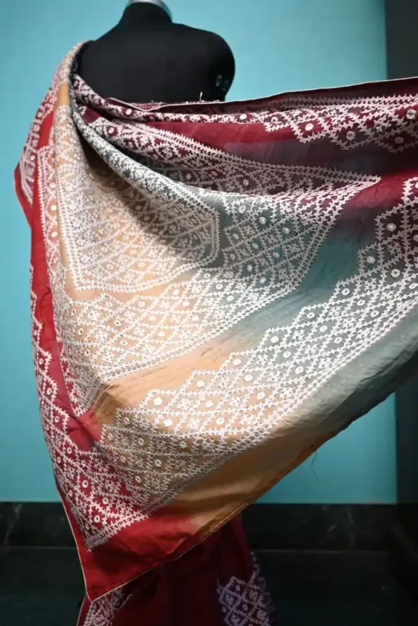 Biscuit on white Gujrati mirror stitch work on Gachhi Tussar silk saree
