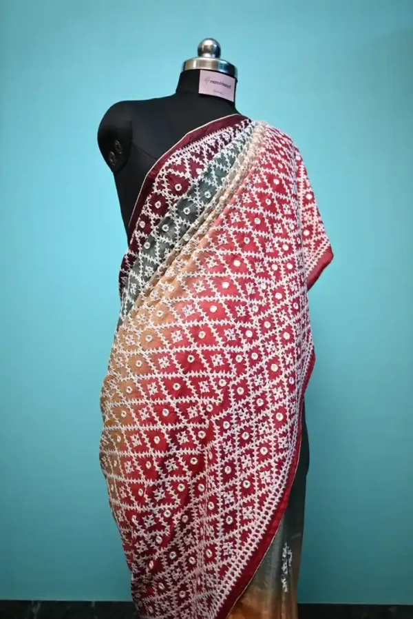 Biscuit on white Gujrati mirror stitch work on Gachhi Tussar silk saree
