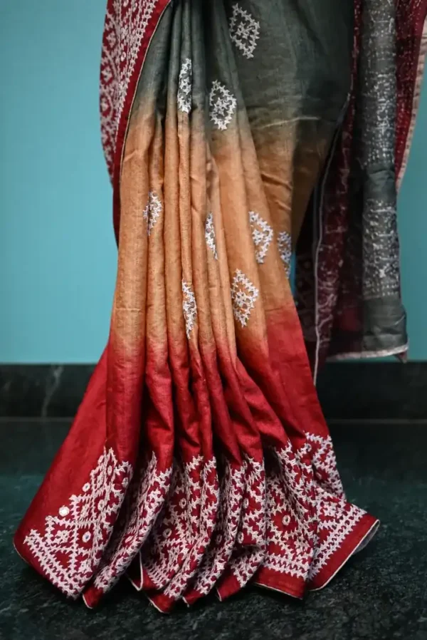 Biscuit on white Gujrati mirror stitch work on Gachhi Tussar silk saree