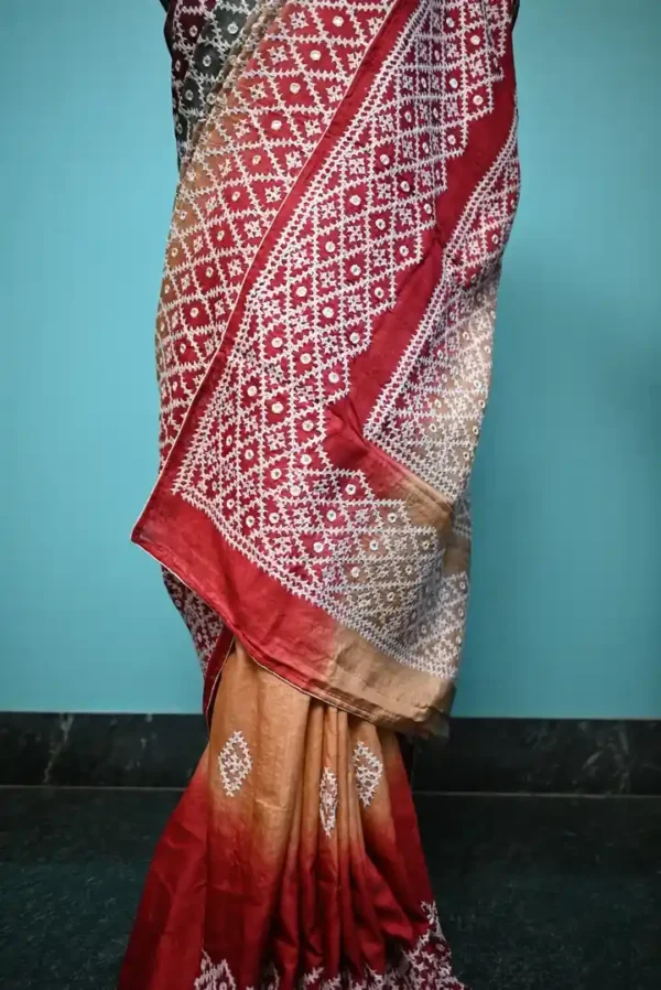 Biscuit on white Gujrati mirror stitch work on Gachhi Tussar silk saree