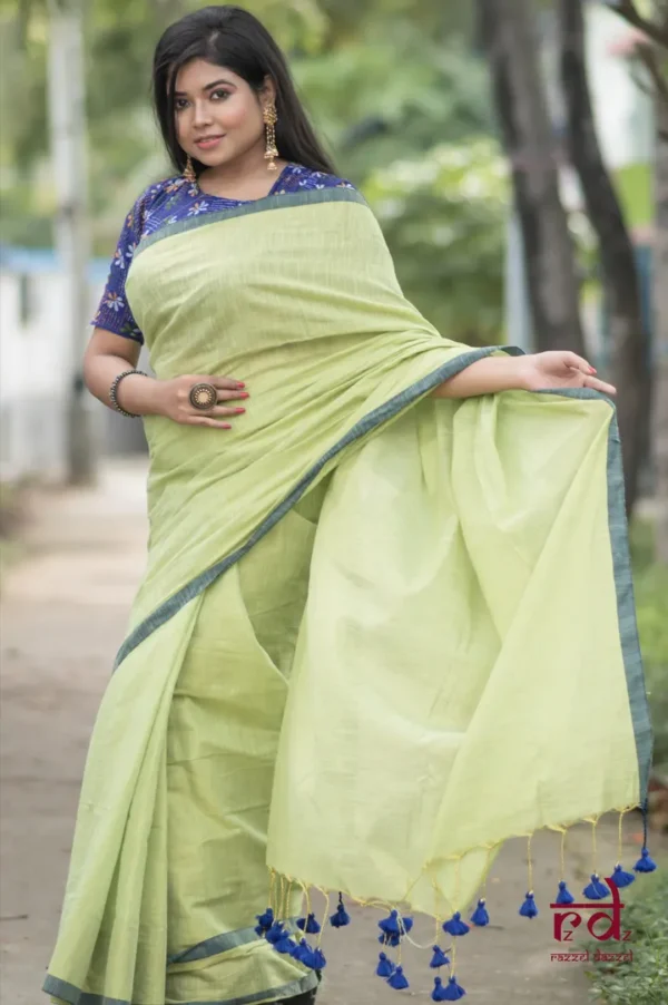 Pesta Green Handloom resham border Tussel on Tissue Khadi Saree