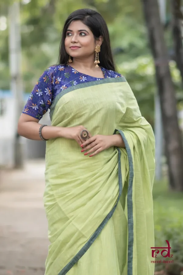 Pesta Green Handloom resham border Tussel on Tissue Khadi Saree