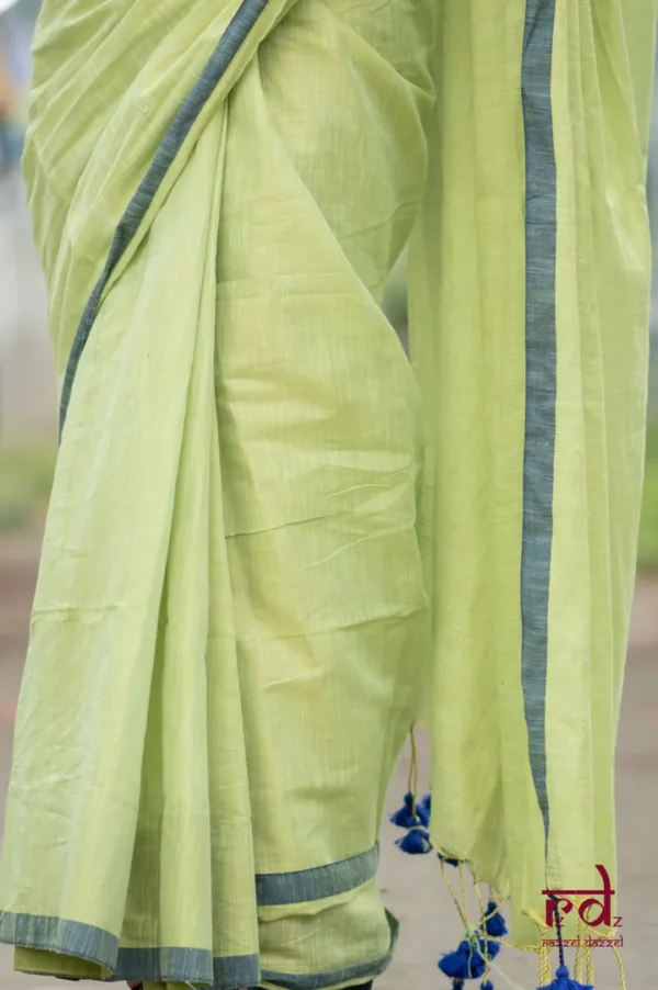 Pesta Green Handloom resham border Tussel on Tissue Khadi Saree