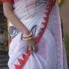white with Mother love Applique work on Handloom Resham kota Saree