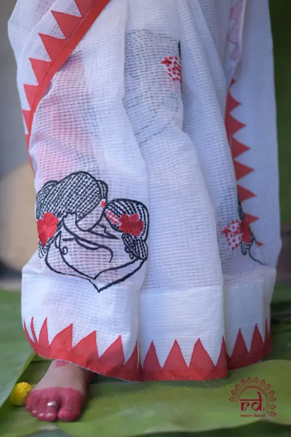 white with Mother love Applique work on Handloom Resham kota Saree