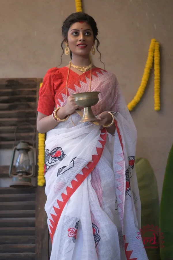 white with Mother love Applique work on Handloom Resham kota Saree