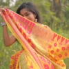Yellow on pink butta n Temple Border Pure Resham silk Soft Jamdani saree