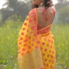 Yellow on pink butta n Temple Border Pure Resham silk Soft Jamdani saree