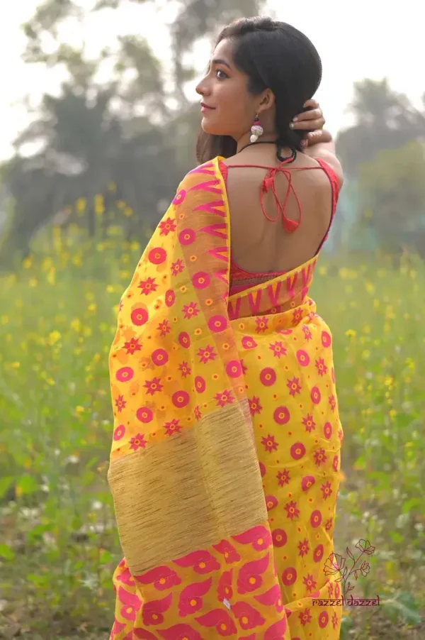 Yellow on pink butta n Temple Border Pure Resham silk Soft Jamdani saree