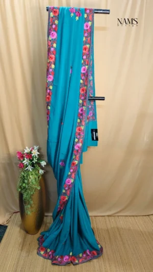 Exquisite Cyan Green Georgette Floral Saree – Elegant & Vibrant