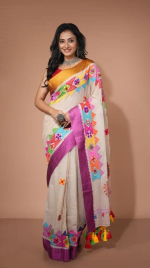 Off-white Cotton Silk Saree with Vibrant Multicolor Lambani Embroidery & Contrast Border | 2025