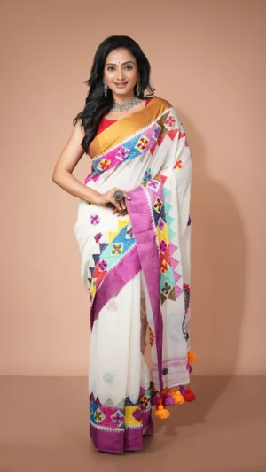 Pristine White Cotton Silk Saree with Vibrant Multicolor Lambani Embroidery | 2025