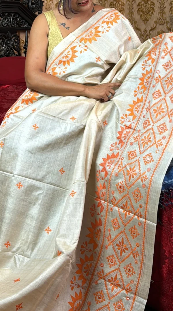 Vibrant Beige Pure Tussar Silk Fusion Kantha & Gujrati Embroidered Saree
